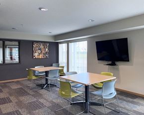 Ramsey apartment for rent - A conference room with a large table and chairs.