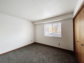 Worthington apartment for rent - A room with a window showing a street view outside.