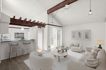 Prairie Village apartment for rent - a living room with a couch and a kitchen with a bar