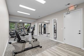 Olathe apartment for rent - the gym at the whispering winds apartments in pearland, tx at Millcreek Woods Apartments, Olathe, KS
