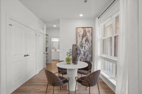 Overland Park apartment for rent - a dining room with a white table and chairs
