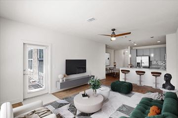 Kansas City apartment for rent - a living room with a couch and a television