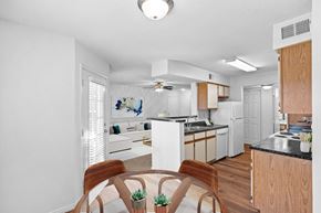 Overland Park apartment for rent - a kitchen and living room in a 555 waverly unitat Stonebriar Apartments, Overland Park, KS, 66213