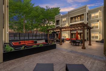 Lush outdoor lounge at west 39th street apartments