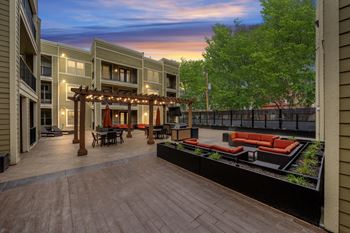 Spacious outdoor social lounge at west 39th street apartments