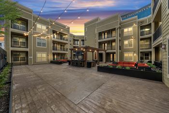 Vibrant courtyard lounge with city views at west 39th street apartments