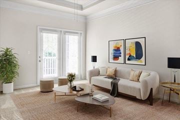Overland Park apartment for rent - a living room with a couch and a coffee table