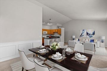 Overland Park apartment for rent - a dining room and living room with a table and chairs