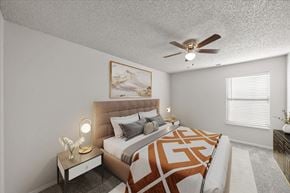 Kansas City apartment for rent - Bedroom with ceiling fan at Cloverset Active Adult Apartments, Kansas City, 64114