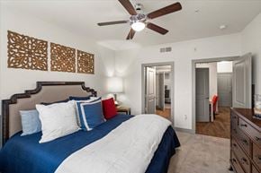 Lewisville apartment for rent - Bedroom with ceiling fan at Ovation at Lewisville Apartments, Texas , 75067