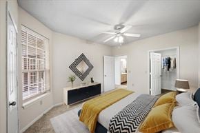 Overland Park apartment for rent - Bedroom With Ceiling Fan at The Claremont Apartment Homes, Overland Park