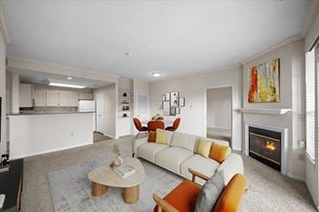 A living room with a fireplace and a couch.