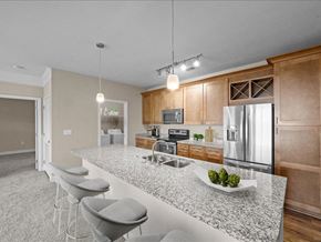 Overland Park apartment for rent - a kitchen with a granite counter top at Sorrento at Deer Creek Apartment Homes, Overland Park, KS, 66213