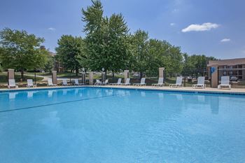 Swimming pool with relaxing sundecks