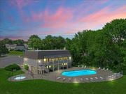 Overland Park townhouse for rent - A house with a pool in the backyard at Sheridan Ridge Townhomes Apartments, Overland Park, KS, 66212