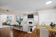 Dallas apartment for rent - a living room with a couch a table and a fireplace at Creekview Apartment Homes, Texas, 75254
