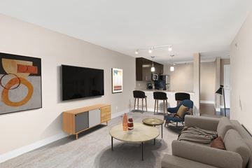 Kansas City apartment for rent - a living room with a couch and a table