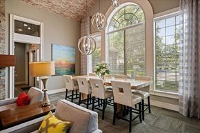 Overland Park apartment for rent - A dining room with a table set for six.