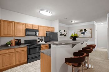 Kitchen with brown wooden cabinets