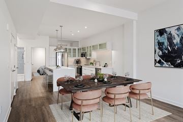 Kansas City apartment for rent - a living room and dining room with a table and chairs
