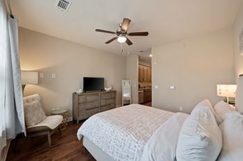 Guest suite bedroom with kitchen access
