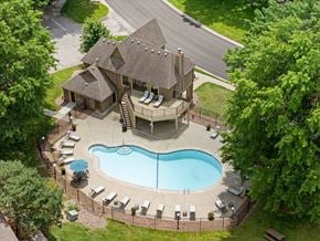 Overland Park apartment for rent - A house with a pool in the backyard.