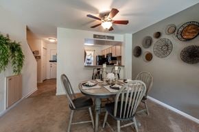 Savannah apartment for rent - Dining table with breakfast bar looking into the kitchen at Fords Pointe Apartments
