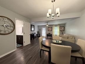 Rock Hill apartment for rent - A dining room with a large table and chairs.