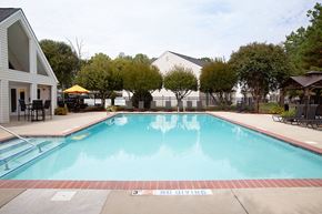 Mooresville apartment for rent - A pool with a diving sign on the side.