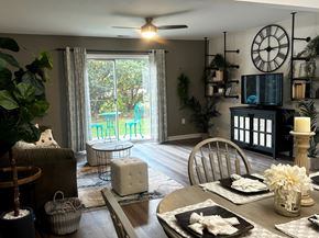 Savannah apartment for rent - A dining room with a table set for a meal.