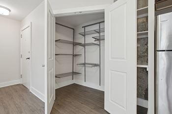 Premium package walk-in closet configured with elfa system