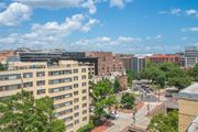 Washington apartment for rent - an aerial view of a city street with buildings and trees