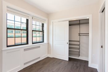 Premium package reach-in closet configured with elfa system