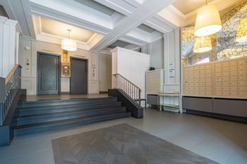 Elegant neoclassical lobby with coffered ceiling