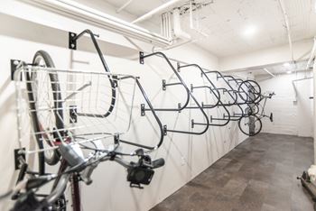 Complimentary bike storage with repair stand