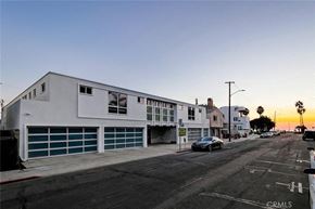 Hermosa Beach apartment for rent - a white building with a car parked on a street