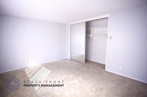 Inglewood apartment for rent - a bedroom with a closet and a carpeted floor