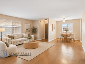 Lakewood apartment for rent - A living room with a couch, a coffee table, a dining table, and chairs.