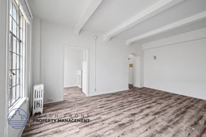 Los Angeles apartment for rent - a living room with white walls and a wood floor