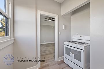 Los Angeles apartment for rent - a kitchen with a stove and a ceiling fan