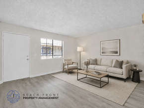 Long Beach apartment for rent - A living room with a couch, chair, and coffee table.