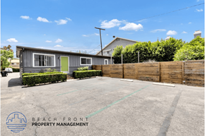 Costa Mesa apartment for rent - an empty parking lot in front of a house