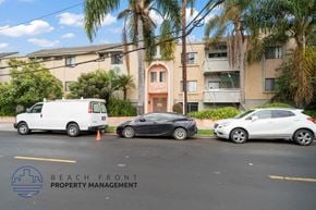 Los Angeles apartment for rent - three cars parked in front of an apartment building