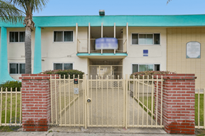 Lennox apartment for rent - A building with a gate and a sign that says