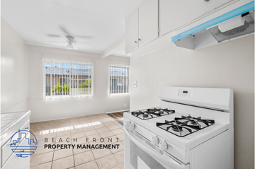 Gardena apartment for rent - an image of a kitchen with white appliances and a stove