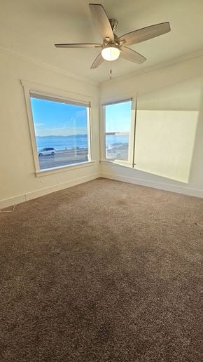 Redondo Beach apartment for rent - A room with a ceiling fan and a window overlooking the beach.