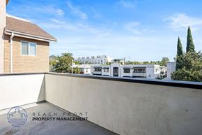 West Hollywood apartment for rent - the view from the roof of a building with a roof top terrace and a