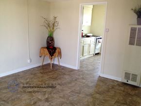 Lennox apartment for rent - a vase on a table in the corner of a room