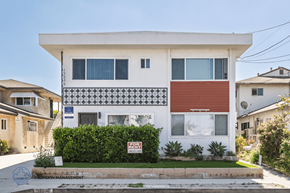 Hawthorne apartment for rent - A white house with a red awning is for sale.