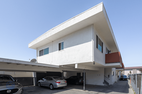 Hawthorne apartment for rent - A modern house with a white exterior and a car parked in the driveway.
